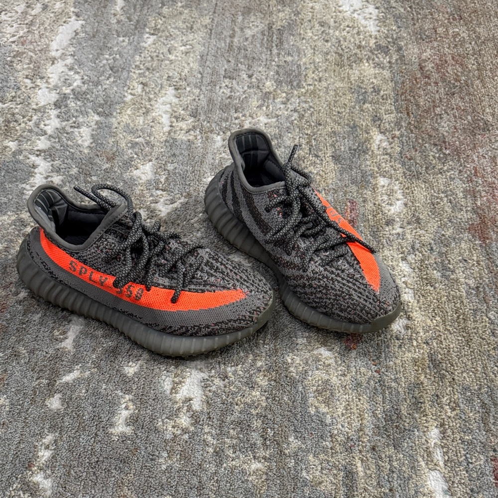 Yeezy Black and Orange Boost Sneakers